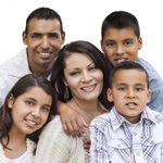 Smiling family portrait, white background