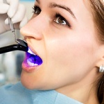 Woman undergoing dental bonding in Grapevine