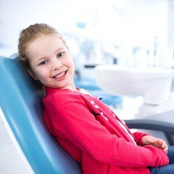 young girl in dental chair