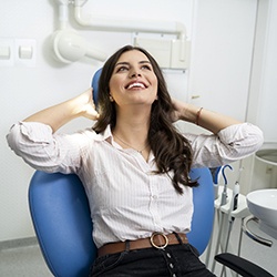 Woman smiles while visiting Grapevine sedation dentist