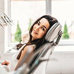 Woman smiling in dentist's chair