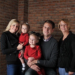 Family of five smiling after preventive dentistry in Grapevine