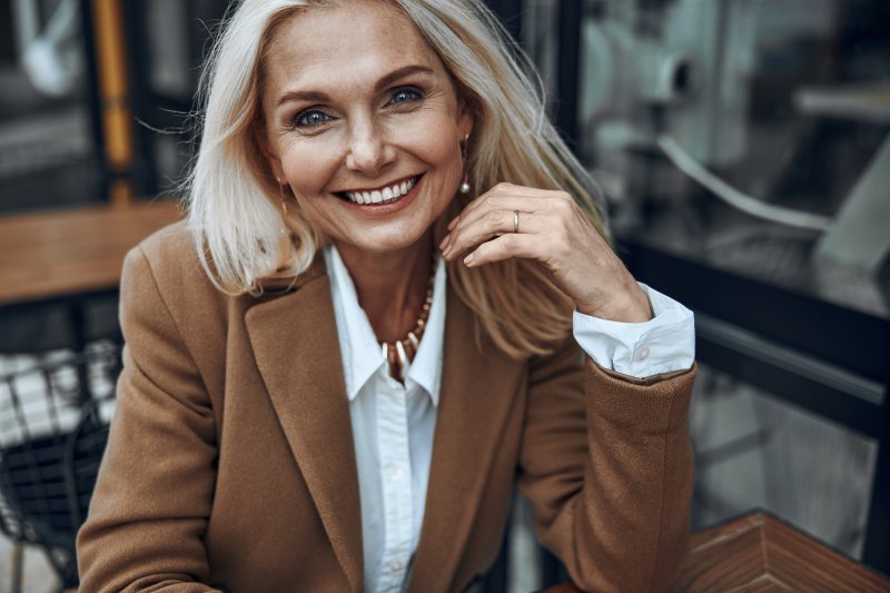 Woman smiling after cosmetic dentistry